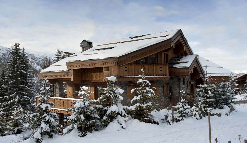 A luxury alpine chalet set in a winter wonderland