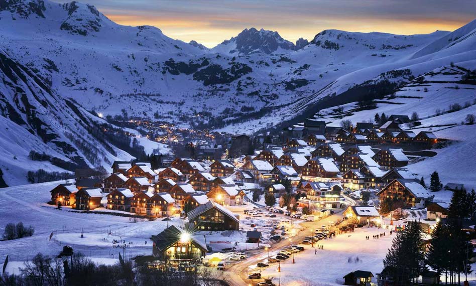 A charming French ski resort at night